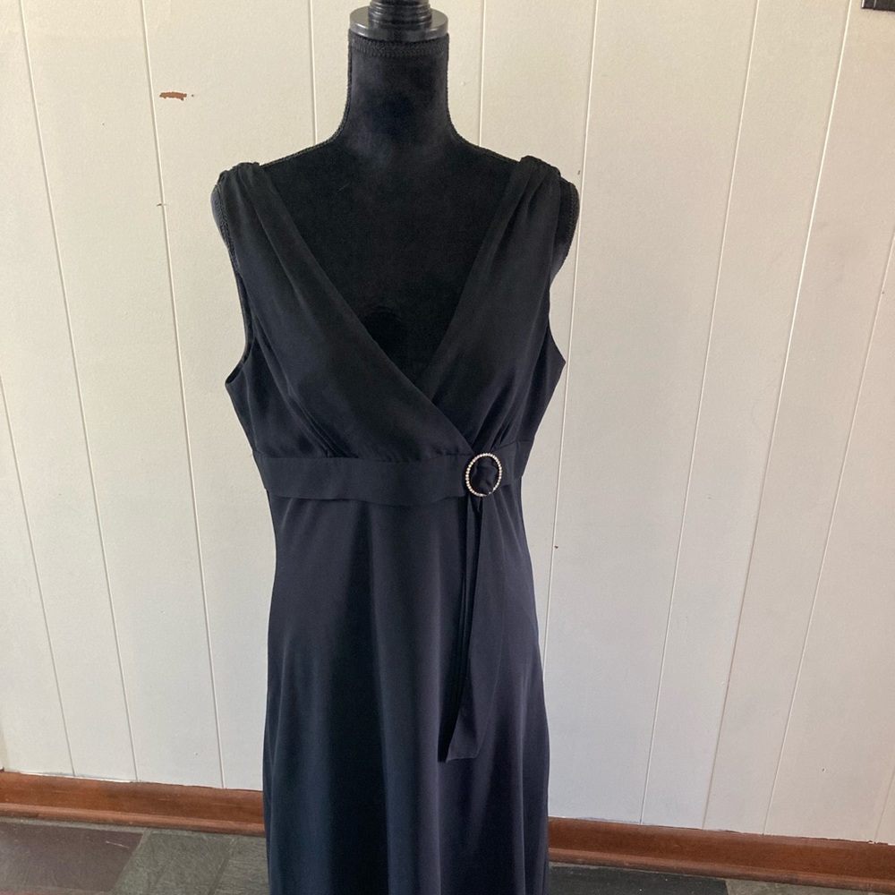 Beautiful black lined cocktail dress